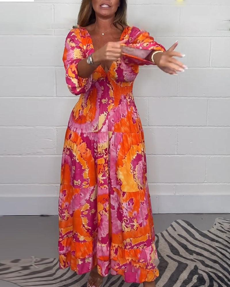 NOËLLE™ | Diepe V kleurrijke lange jurk