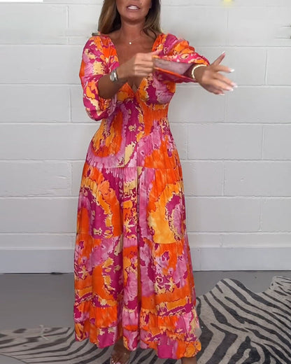 NOËLLE™ | Diepe V kleurrijke lange jurk