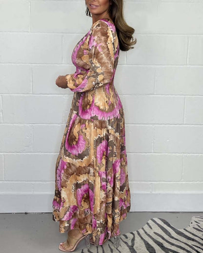 NOËLLE™ | Diepe V kleurrijke lange jurk