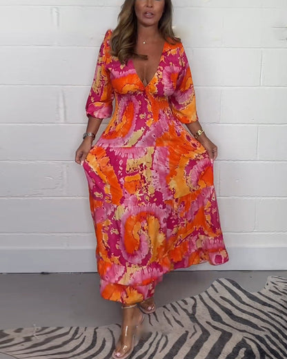 NOËLLE™ | Diepe V kleurrijke lange jurk